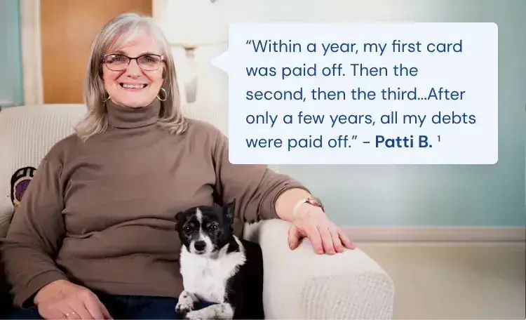 woman with long brown hair smiling because she has found debt relief
