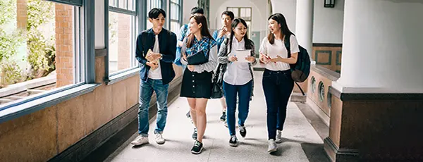 students_walking_in_hall.jpg